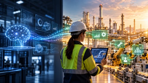Industrial engineer using a tablet in a smart manufacturing facility with AI-powered data visualizations, connected systems, and automated machinery.